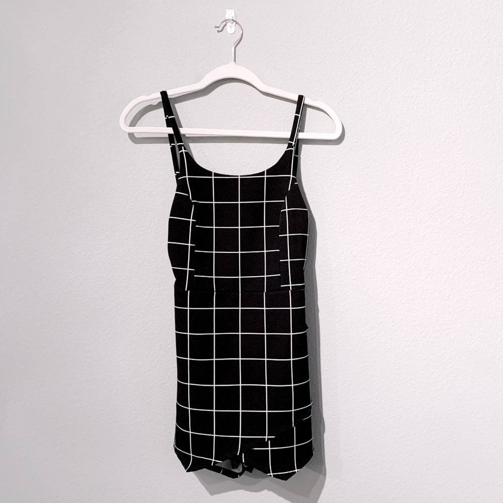 BLUE BLUSH black and white checkered romper.